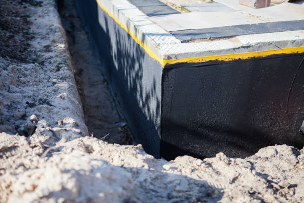 Professional Waterproofing technician working in Brookfield, IL